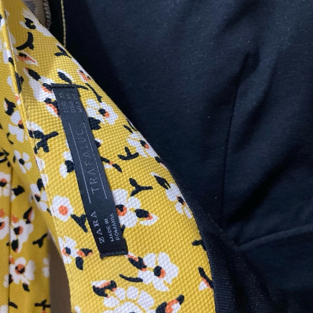 A beautiful mustard dress with bell sleeves.